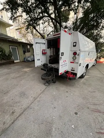 Magnet Plumbing service vehicle on-site for Grease Trap Cleaning in Indian Oaks